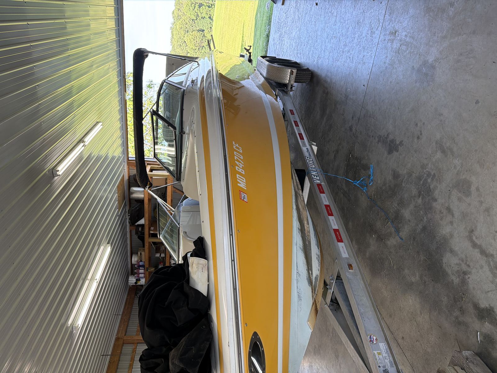 Cabin cruiser boat full detail in garage