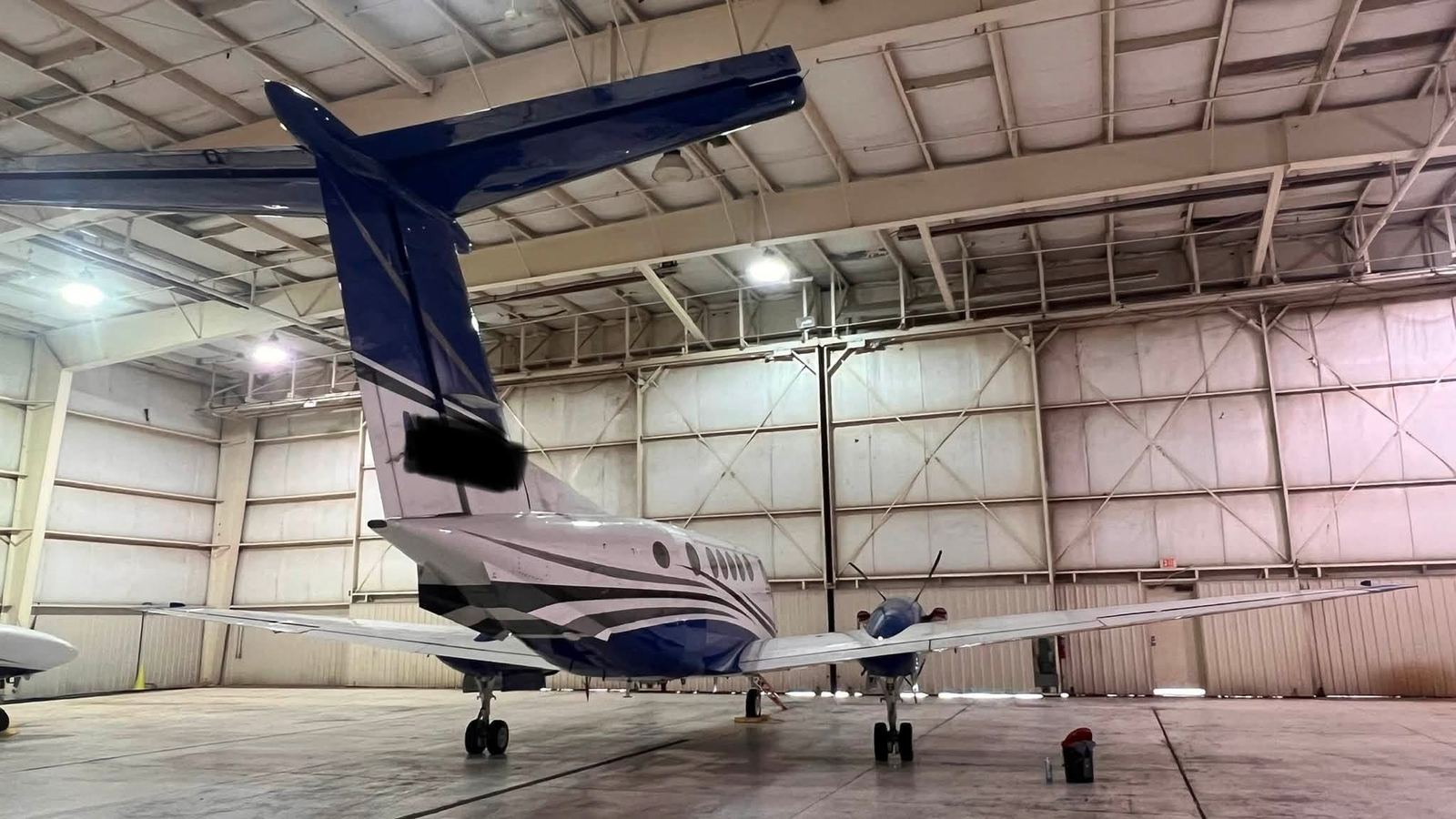Private aircraft detailing in hangar